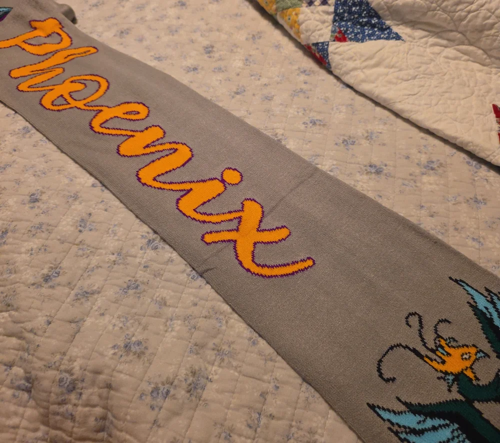 Grey Knit Scarf with Yellow Script 'Phoenix' and Accent Design